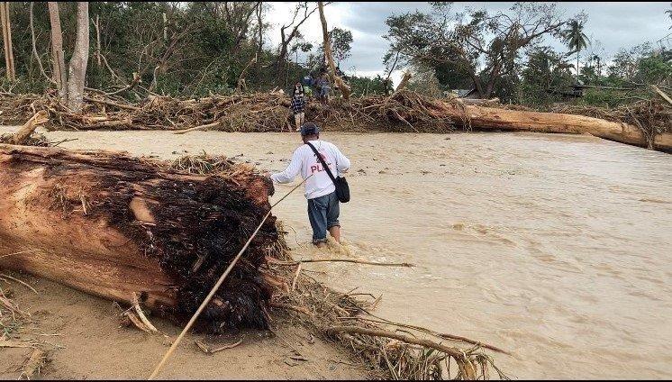 Engineer walks through flood to reconnect Palawan after Super Typhoon Odette