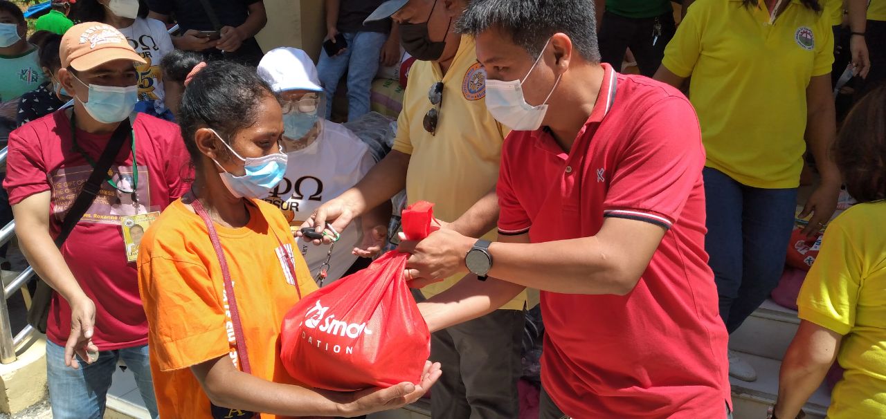Fueled by the spirit of 'malasakit', Smart employees help typhoon-affected communities