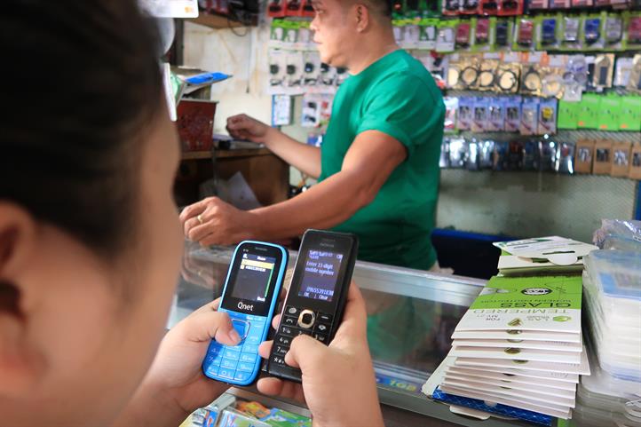 Pangasinan traders boost income with Smart load business Pangasinan traders boost income with Smart load business