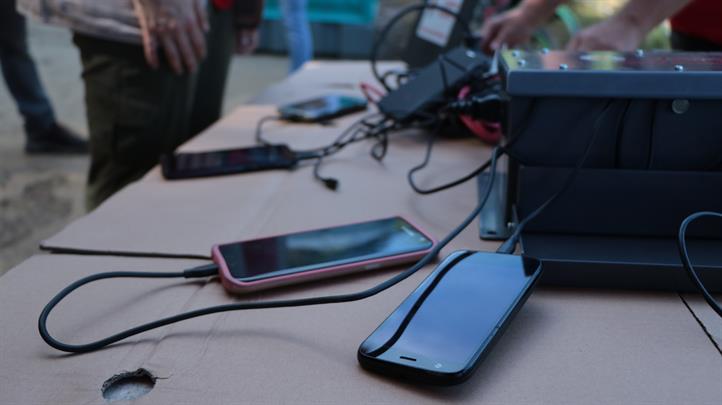 Phones recharge using the Vodafone Instant Charge service at the landslide site. Itogon tragedy: Technology vital in search for signs of life