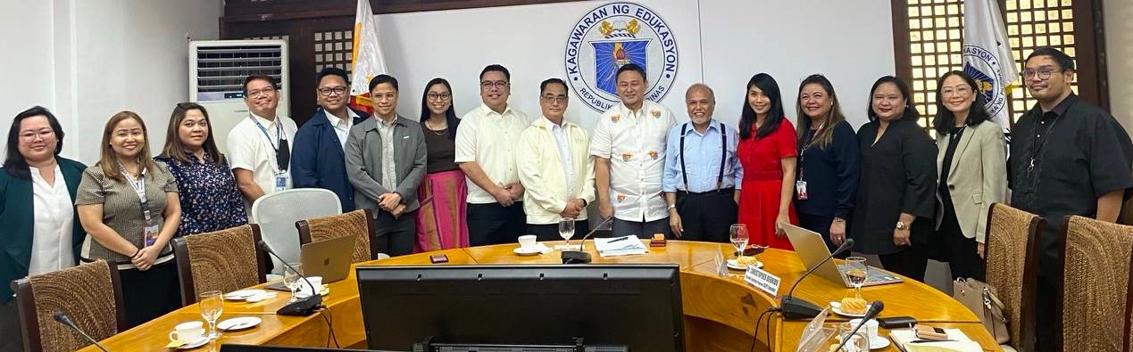 DepEd Sec. Sonny Angara (7th from right); Dr. Christopher Bernido, CVIF Dynamic Learning Program Co-developer (6th from right); Stephanie V. Orlino, AVP and Head of Stakeholder Management at PLDT, Smart (5th from right)