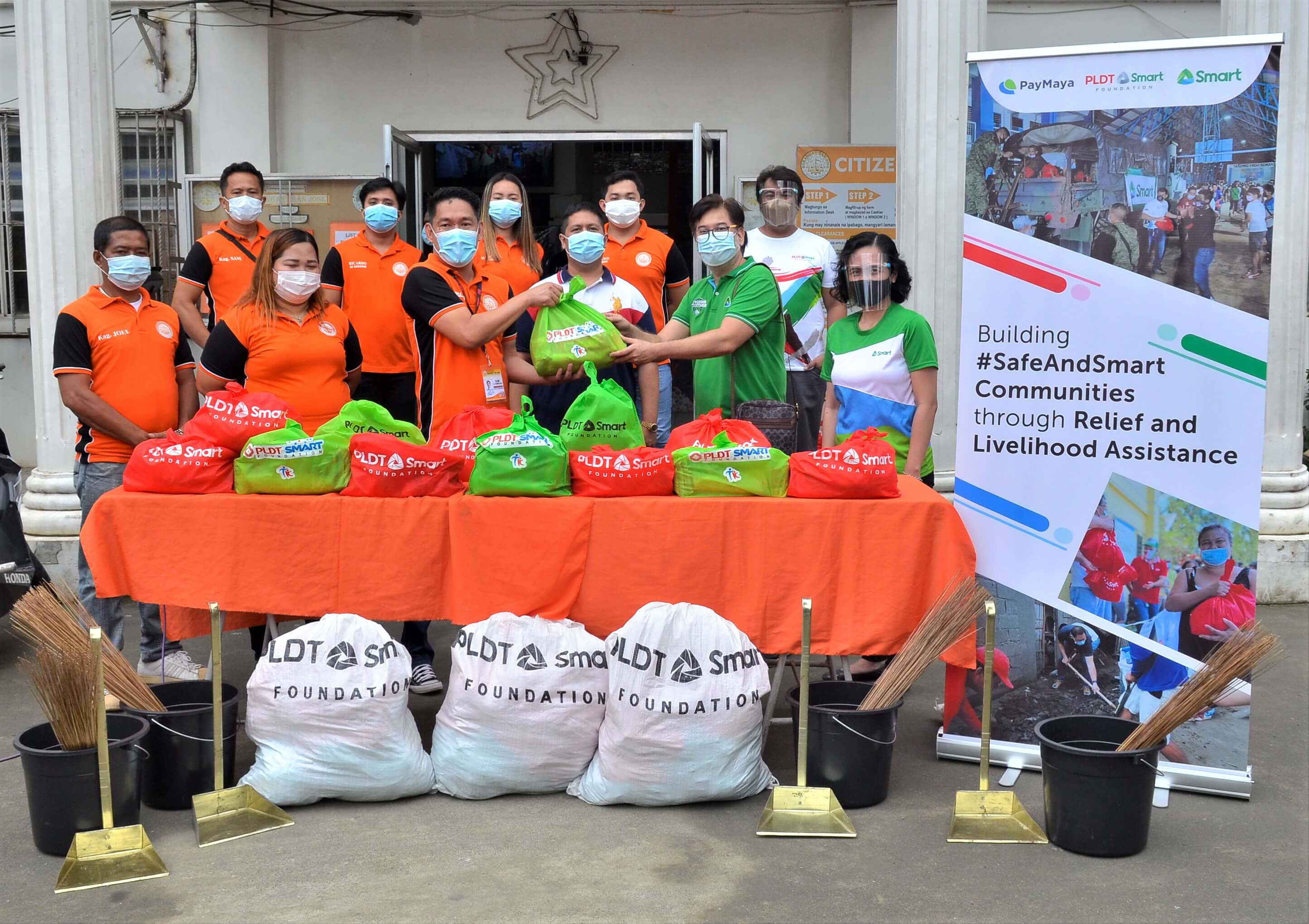 Smart boosts post-typhoon aid with cash-for-work program in Marikina 