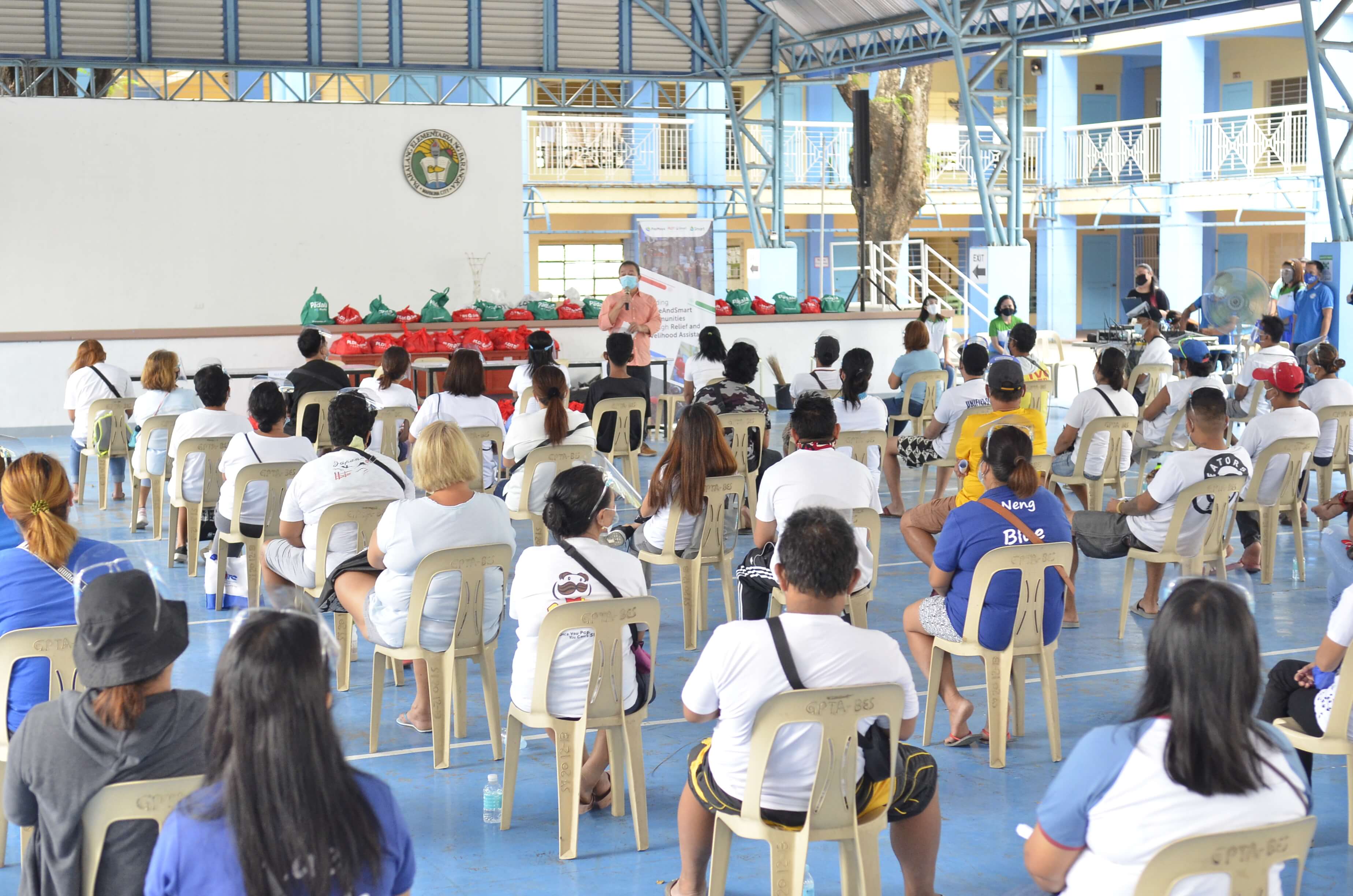 Smart boosts post-typhoon aid with cash-for-work program in Marikina 1