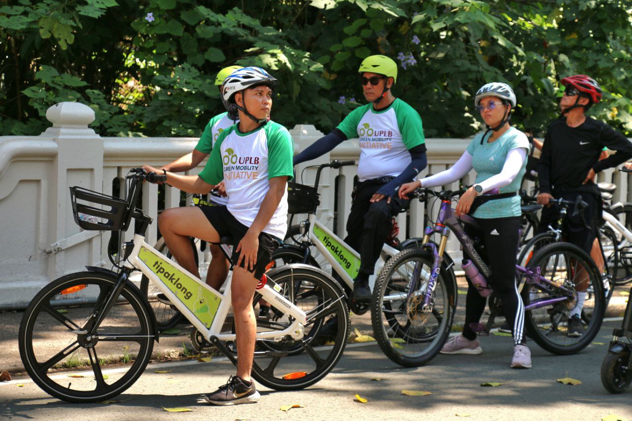 UPLB personnel, students, and guests ride the electric bikes to heritage sites within the campus.