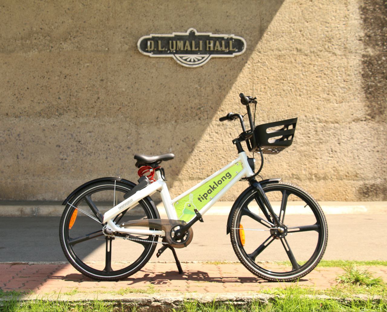Tipaklong is a ride-sharing system where the public, using a mobile digital platform, can rent e-bikes and e-scooters for use inside UPLB.