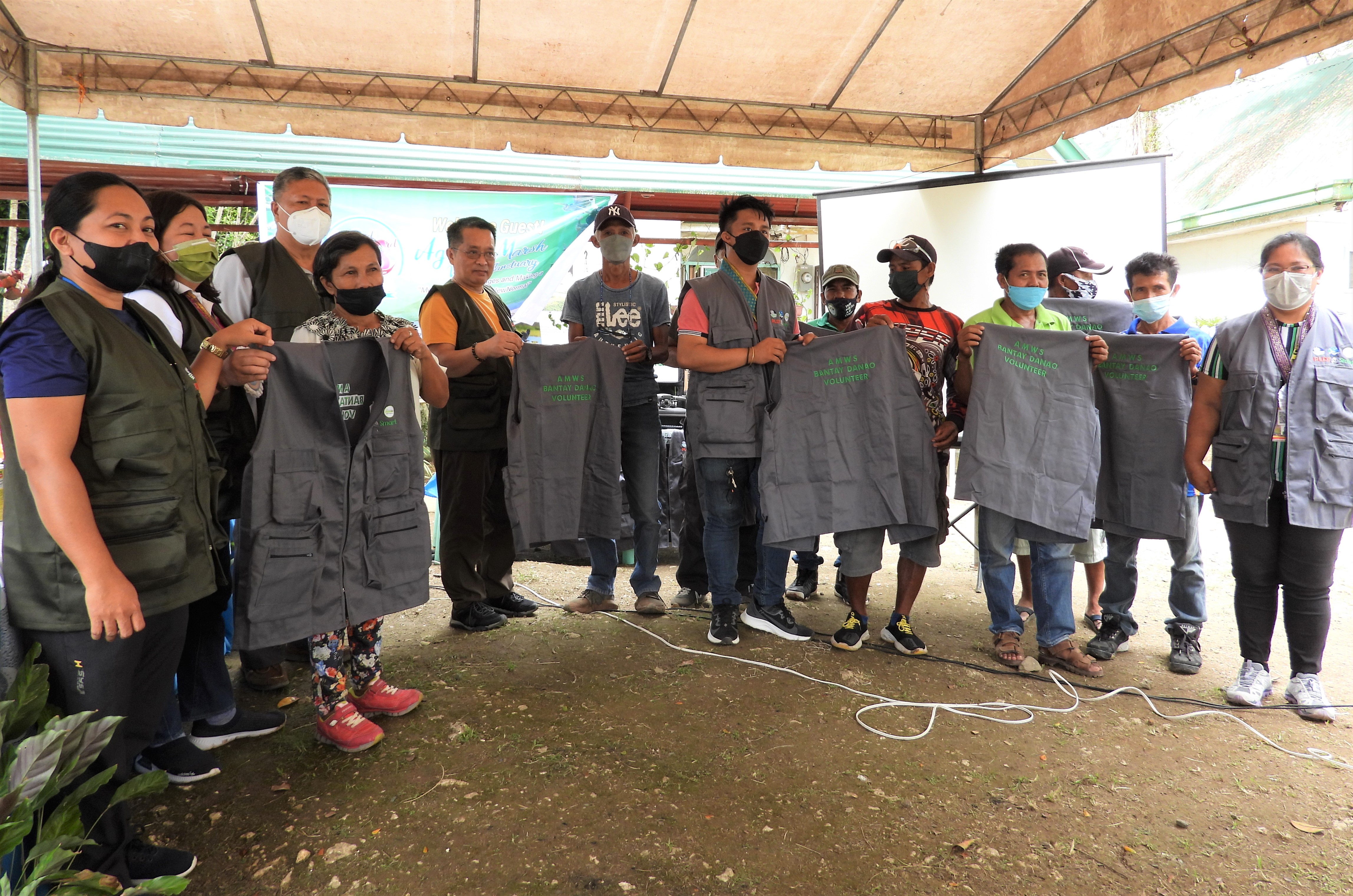 turn-over of vest to Bantay Danao and DENR and LGU partners of AMWS